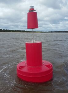 A red Port Buoy in the Barwon River